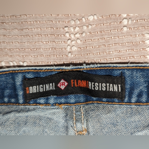 Fire resistant distressed cutoff shorts. - Picture 5 of 7